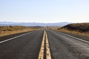 American Road with 2 yellow lines no passing